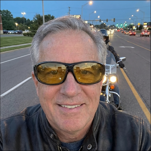 HiLense customer wearing night riding glasses