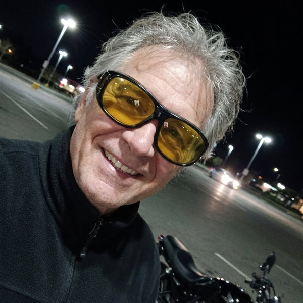 HiLense customer wearing night riding glasses