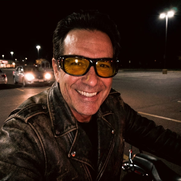 HiLense customer wearing night riding glasses